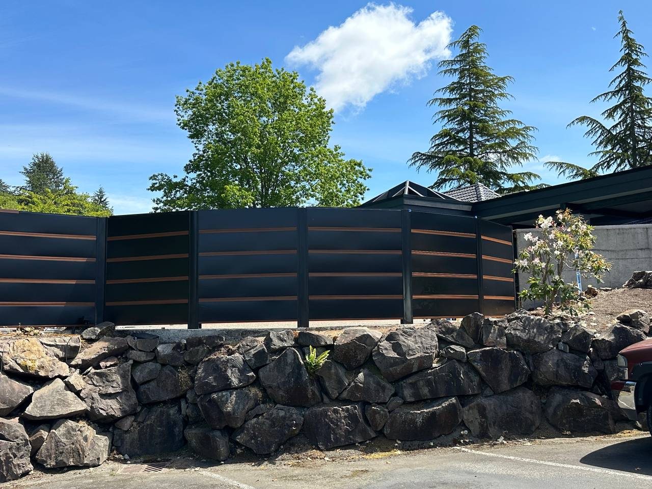 Metal fence on a stone base