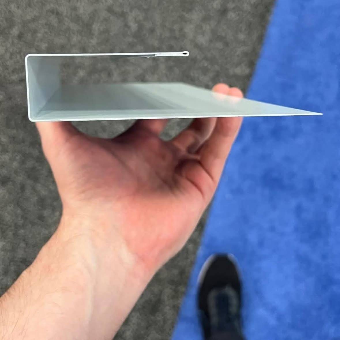 Sheet metal brake forming a custom bend in the Unimasters shop